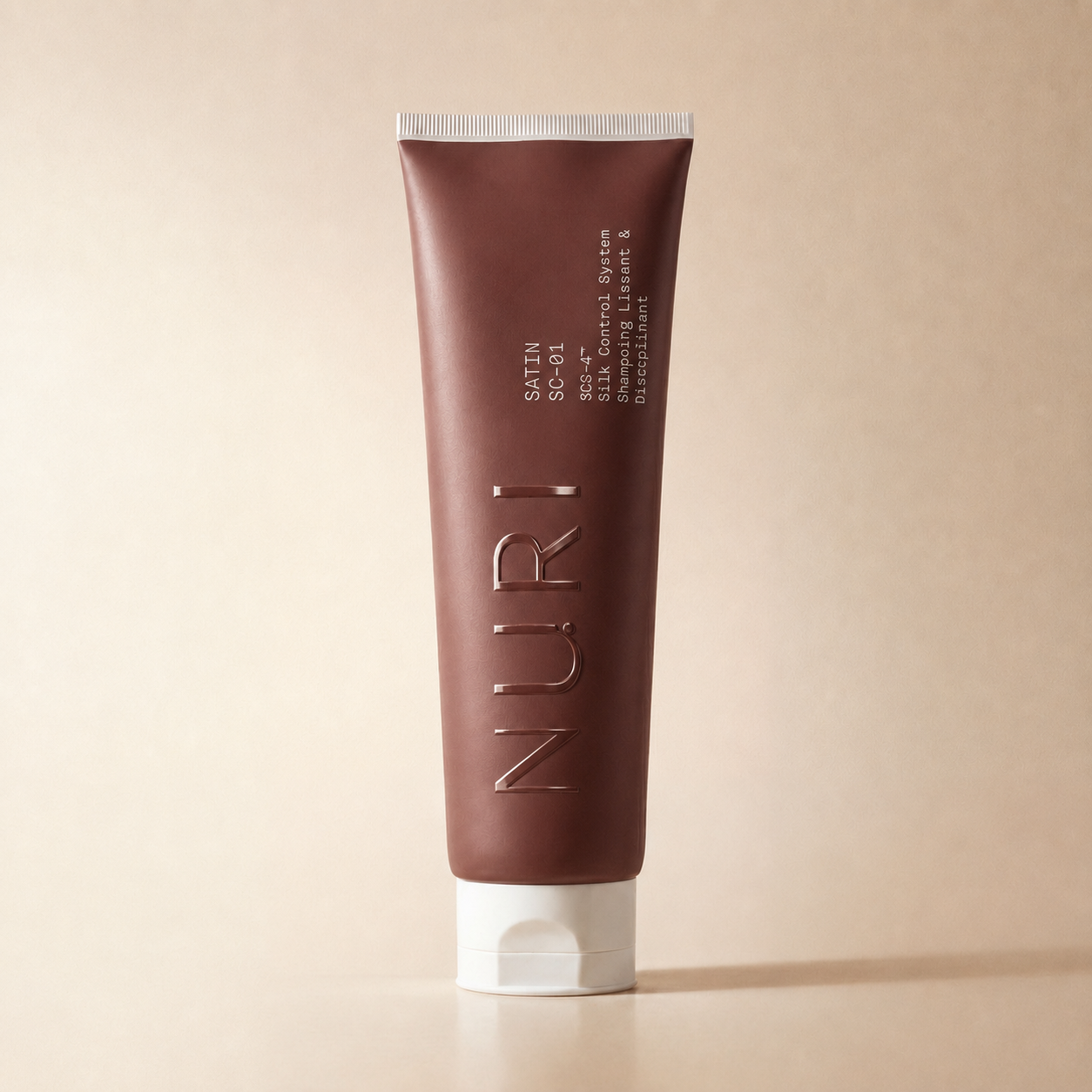 NURI SATIN, shampoing discipline, tube rose poudré
